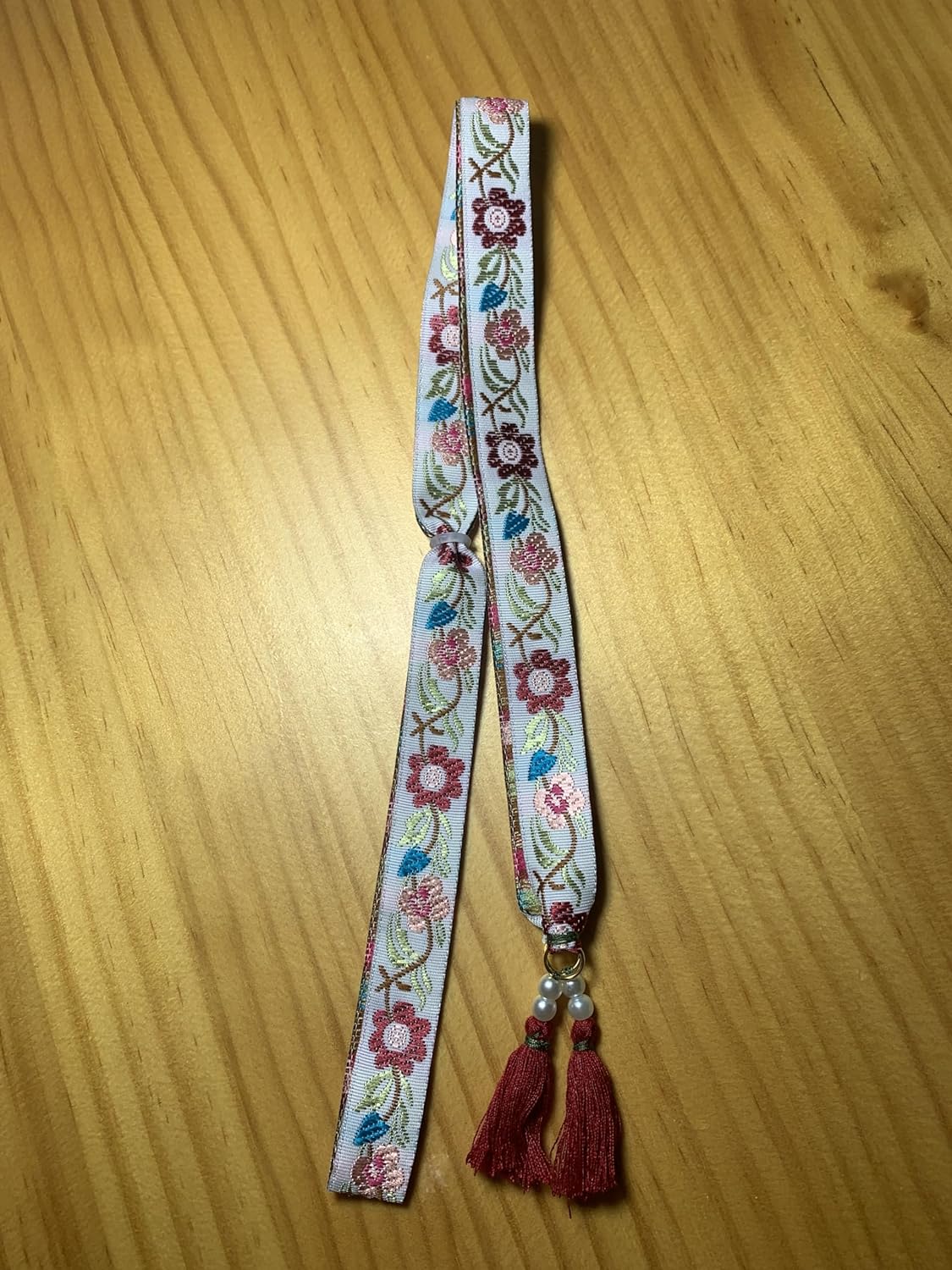 Atapiernas Lligacames ✅Modelo FLORES ROJAS Y BORLAS ROJAS con PERLAS