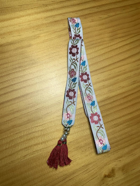 Atapiernas Lligacames ✅Modelo FLORES ROJAS Y BORLAS ROJAS con PERLAS