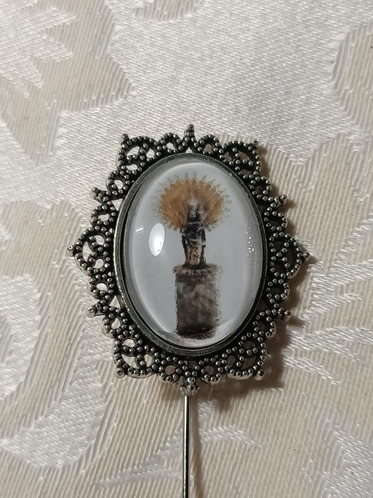 Aguja con imágen de la Virgen del Pilar
